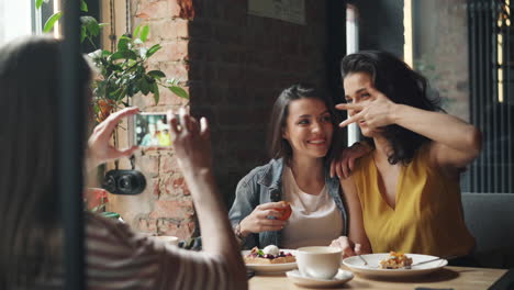 friends enjoying a meal in a cafe