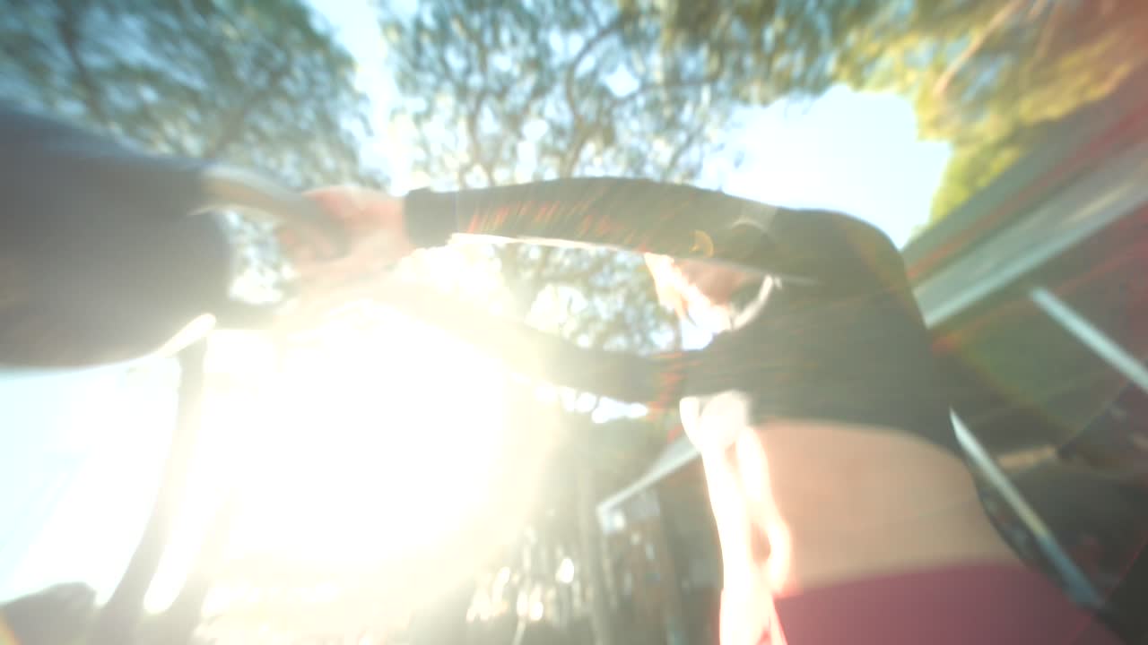 Woman Working Out with Kettlebell in Outdoor Gym