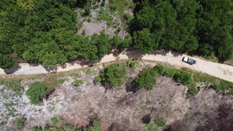 off road safari jeep driving on path in nature expedition - madagascar, africa
