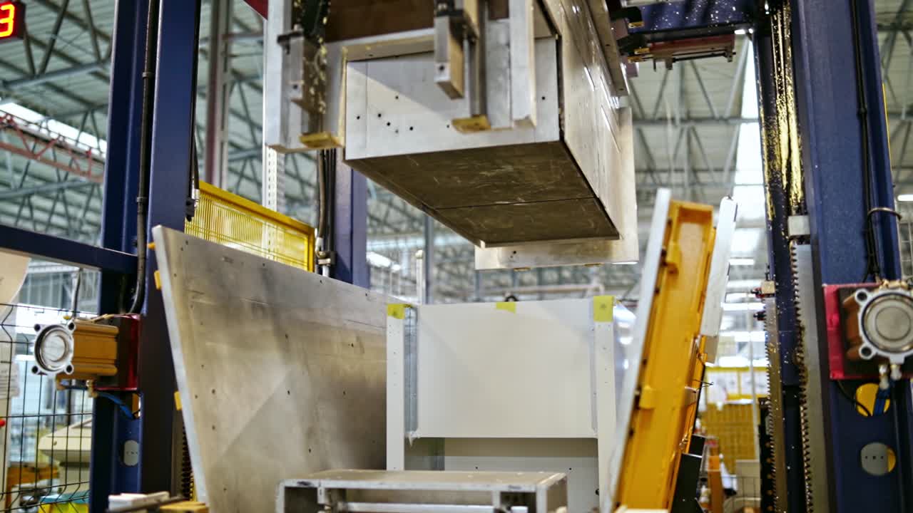 Innovative factory background. Robotic equipment inside the modern plant. Process of making new detail by modernized equipment.