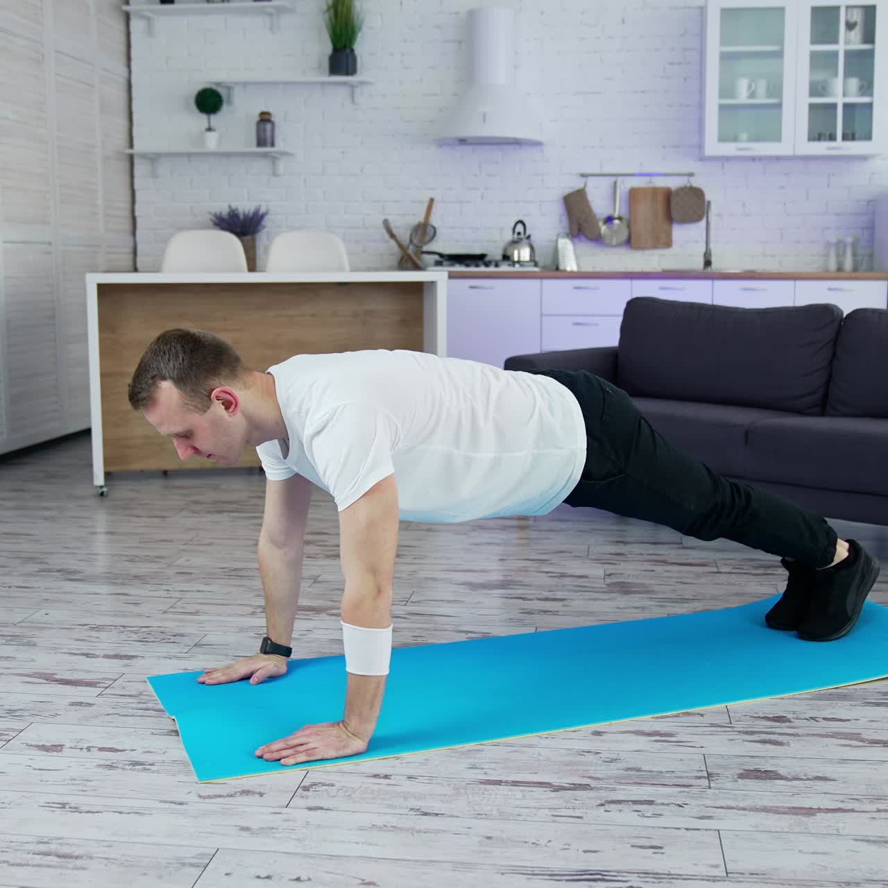 Preparation before sports. Home preparation on the mat before sports