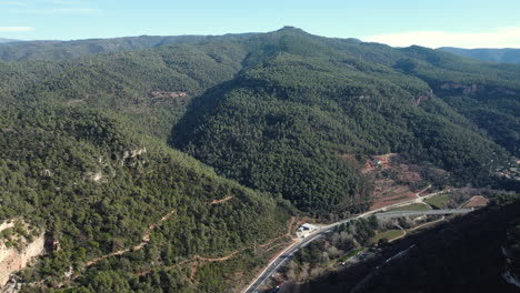 Mountainous Landscape with Highway and Forest