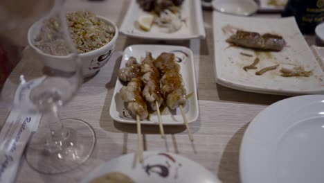 japanese restaurant meal with chicken skewers