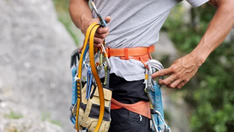 midsection of man wearing harness