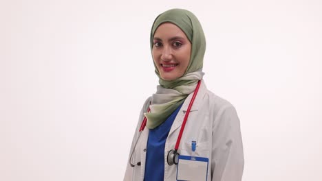 portrait of a confident female muslim doctor in a hijab