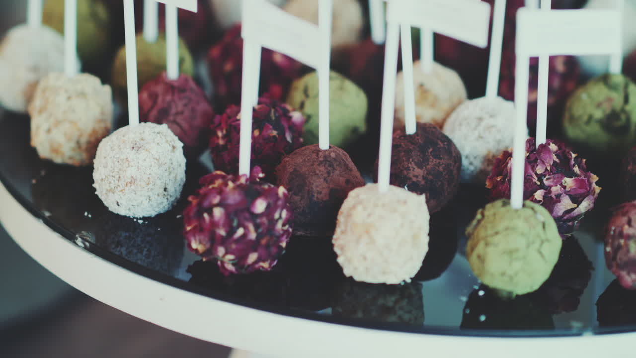 Close Up Of Fresh Lollipops And Chocolate Cookies