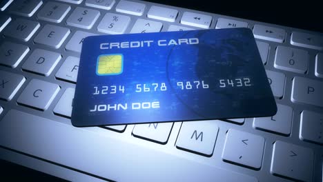 credit card on computer keyboard for online shopping