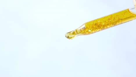 el gotero de suero dorado