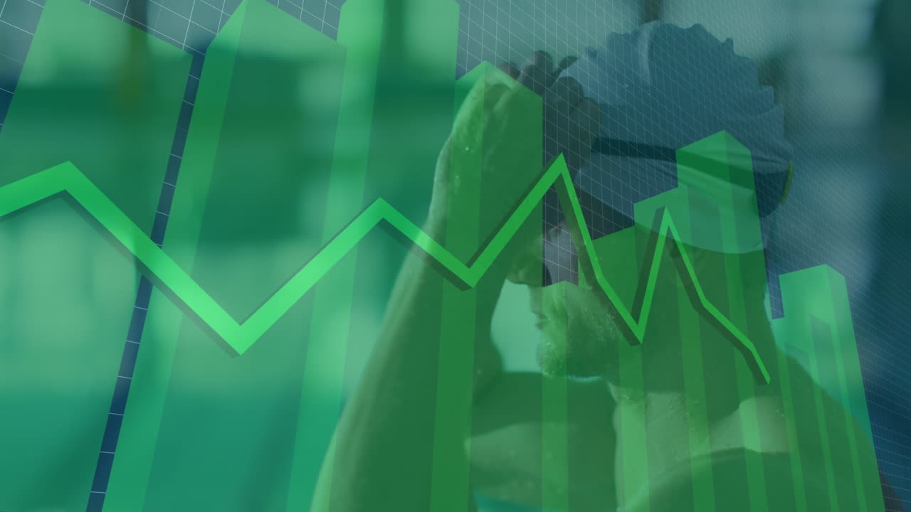 Man wearing VR headset interacting with technology data, showing green bar charts and line graph