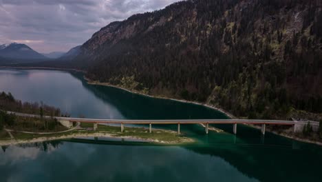 bridge over mountain lake sylvenstein, bavaria, germany