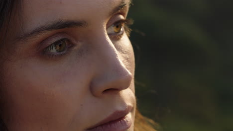 close-up-portrait-of-beautiful-woman-enjoying-peaceful-sunset-exploring-spirituality-looking-up-praying-contemplating-journey-with-wind-blowing-hair