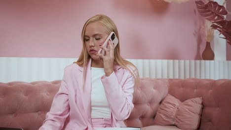 Blonde-girl-having-a-call-at-home