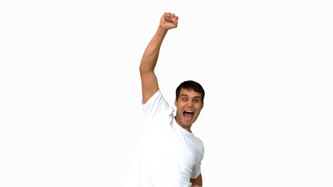 happy man raising arms on white screen