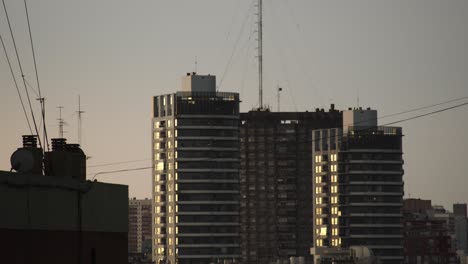 skyscrapers reflecting evening light in buenos aires cityscape with muted tones
