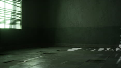 habitación vacía y oscura con sombras de luz solar