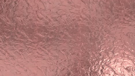 rose gold foil background. gold texture 3d rendering loop 4k