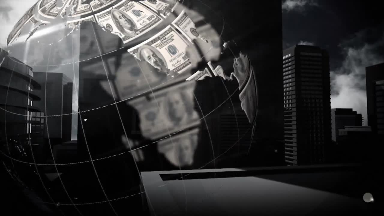 globo giratorio con billetes de dólares