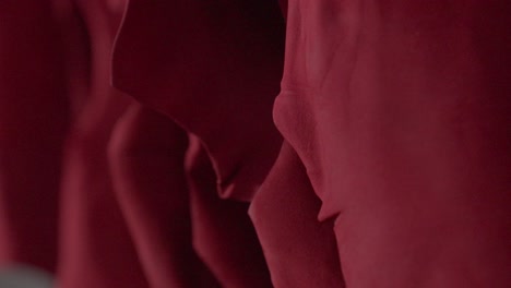 organic leather animal hides hanging in a textiles manufacturing plant, close up shot