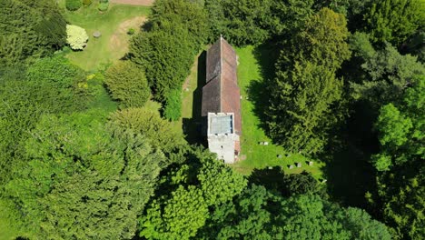 a high-angle upward-tilt shot of lady magdalene church and graveyard