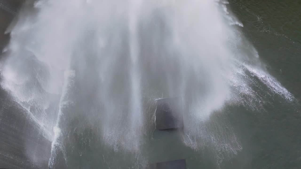 Bursting Water From The Large Pipe Over Presa Barrie In Negreira, A Coruña, Spain. Slow Motion Reveal Shot