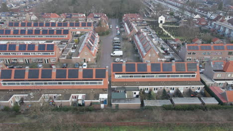 Aerial-dolly-of-new-suburban-neighborhood-with-solar-panels-on-rooftops