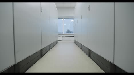 empty modern office corridor with storage racks