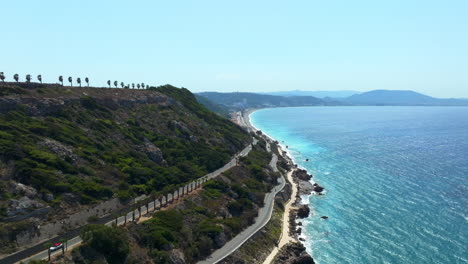 aerial view flying along the coastline of rhodes, bright, sunny day in greece