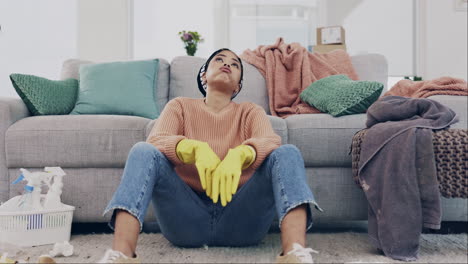 housework, exhausted and woman cleaner on a sofa