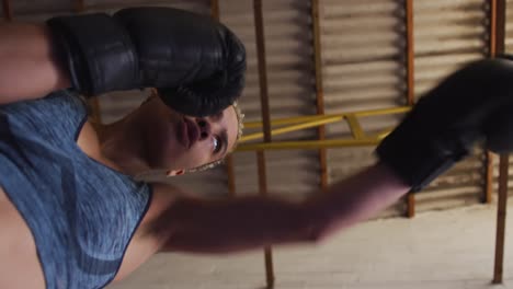 Mixed-race-woman-boxing-
