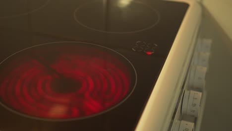 Close-up-of-heated-electric-stove---to-the-red-color