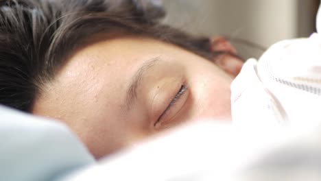 close-up young attractive woman waking up