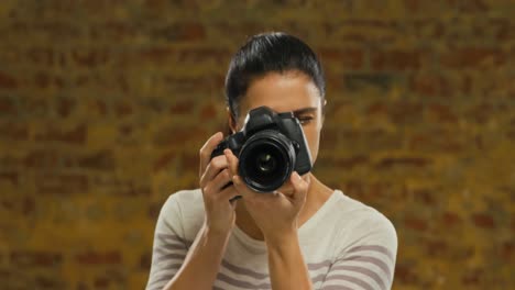 young woman taking photo