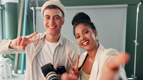 smiling photographer and model in the studio