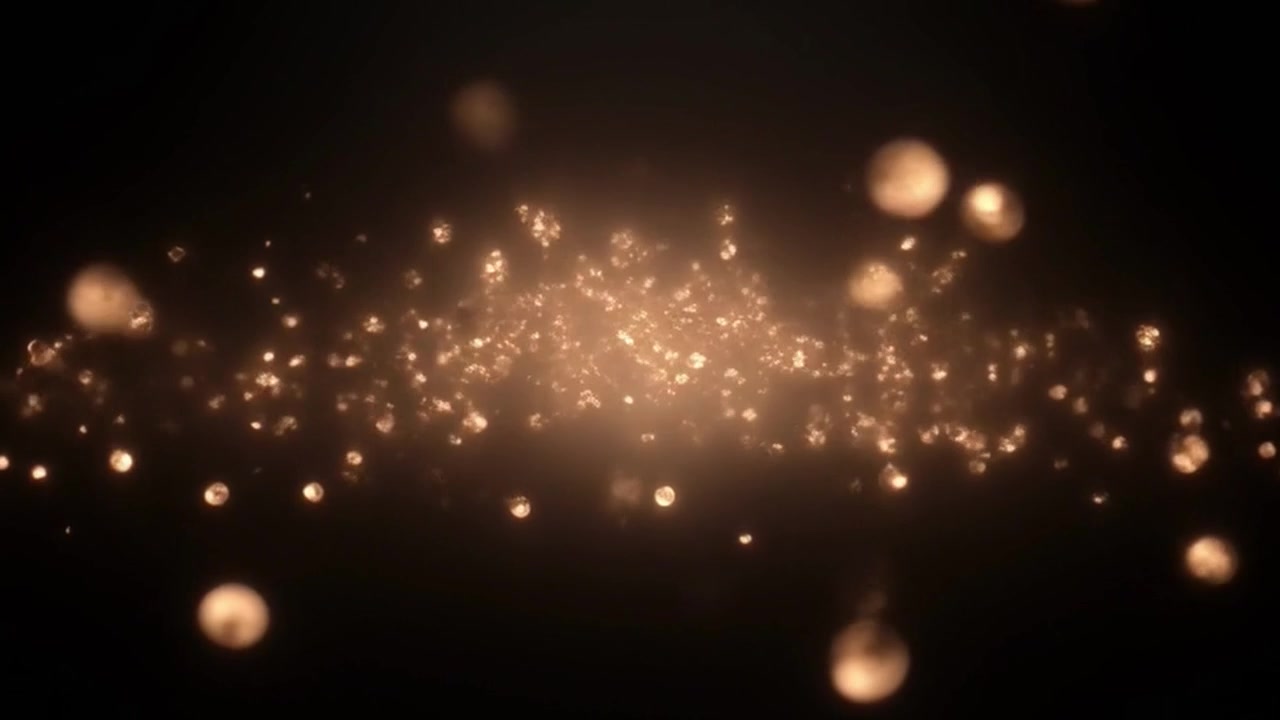 Particelle Dorate Fluttuanti e Sfere Luminose su Sfondo Nero