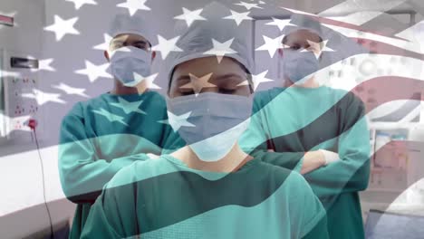 animation of flag of usa waving over surgeons in operating theatre