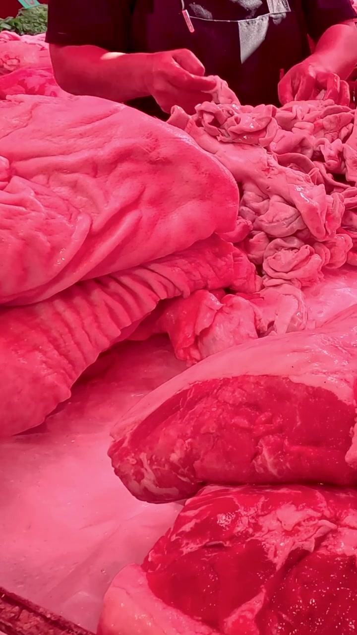 Sequence of meat being processed at a butchery