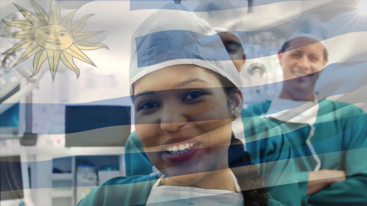 Animação da bandeira do Uruguai tremulando sobre cirurgiões em uma sala de cirurgia
