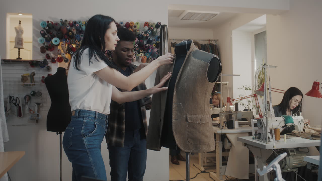 Fashion Designers Working on a Jacket
