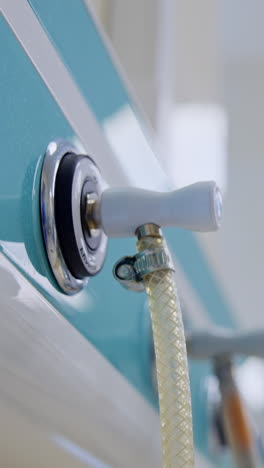 connected tubes of equipment for oxygen supply in surgical room. close up. low angle perspective. blurred backdrop. vertical video