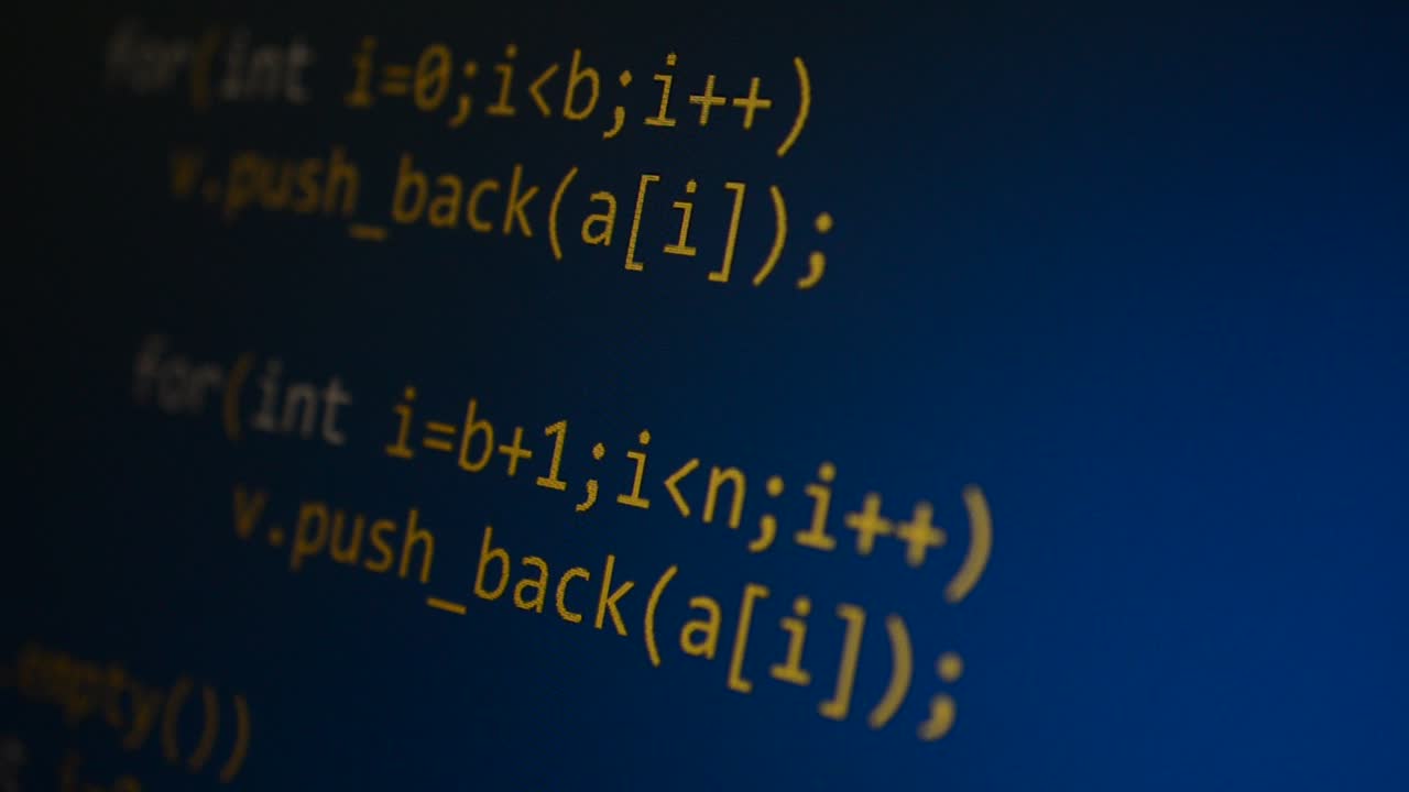 Source code on the monitor screen. Source code
