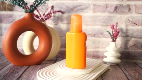 orange sunblock bottle display