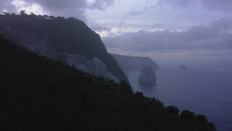 Cinematic-aerial-of-hikers-on-top-of-steep