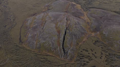 Aerial-above-solid-volcanic-landscape-with-famous-fissure-Lambafell