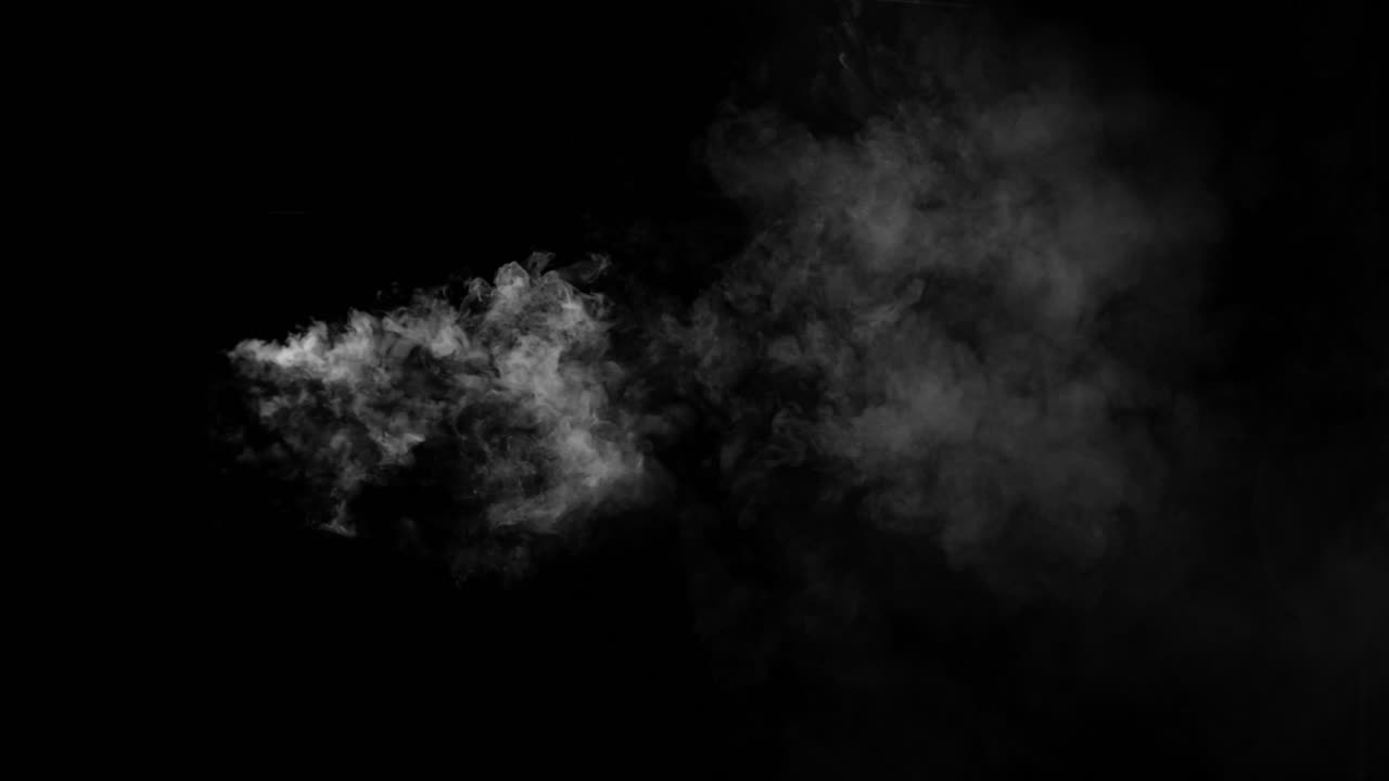 A concentrated stream of white smoke shoots horizontally from left to right on a black background. Isolated VFX element for jets, steam, or energy