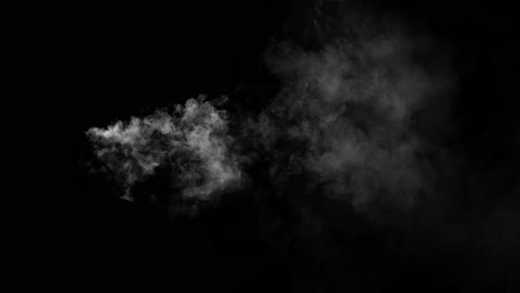 a concentrated stream of white smoke shoots horizontally from left to right on a black background. isolated vfx element for jets, steam, or energy