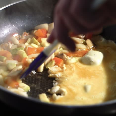 stewed sliced vegetables in pan