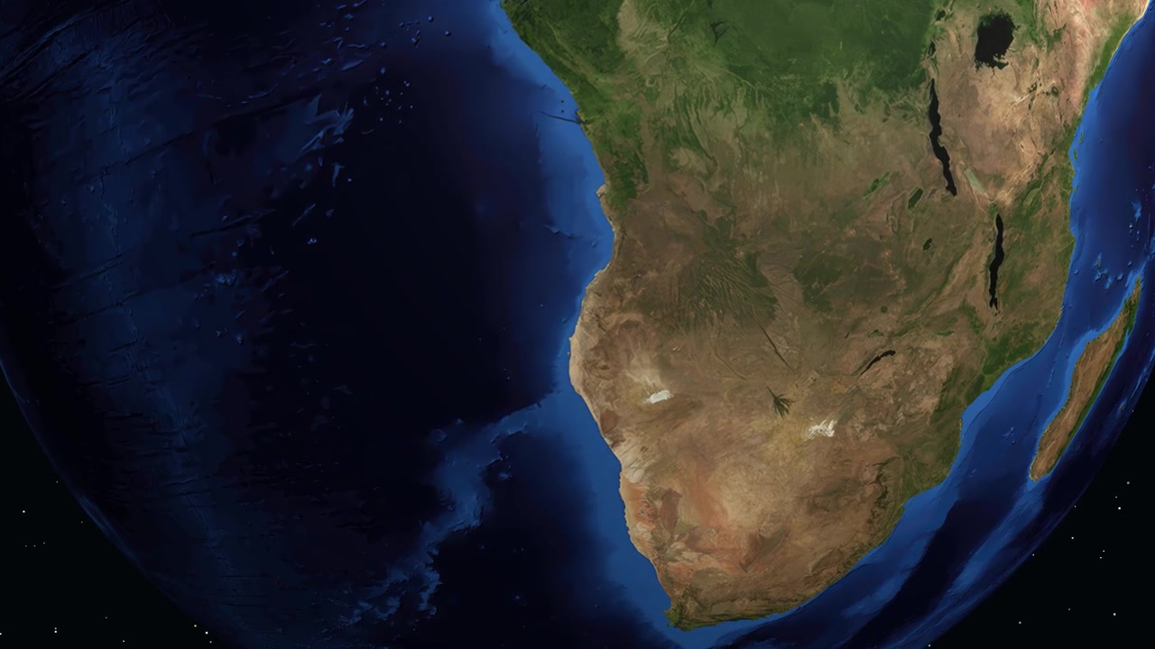 La terra digitale ruota e zooma su Namibe, Angola, con una sovrapposizione di un pannello informativo dettagliato.