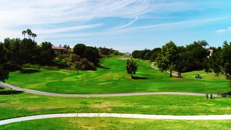 drone shot of golf course showing the fairway in golf community in san diego, california