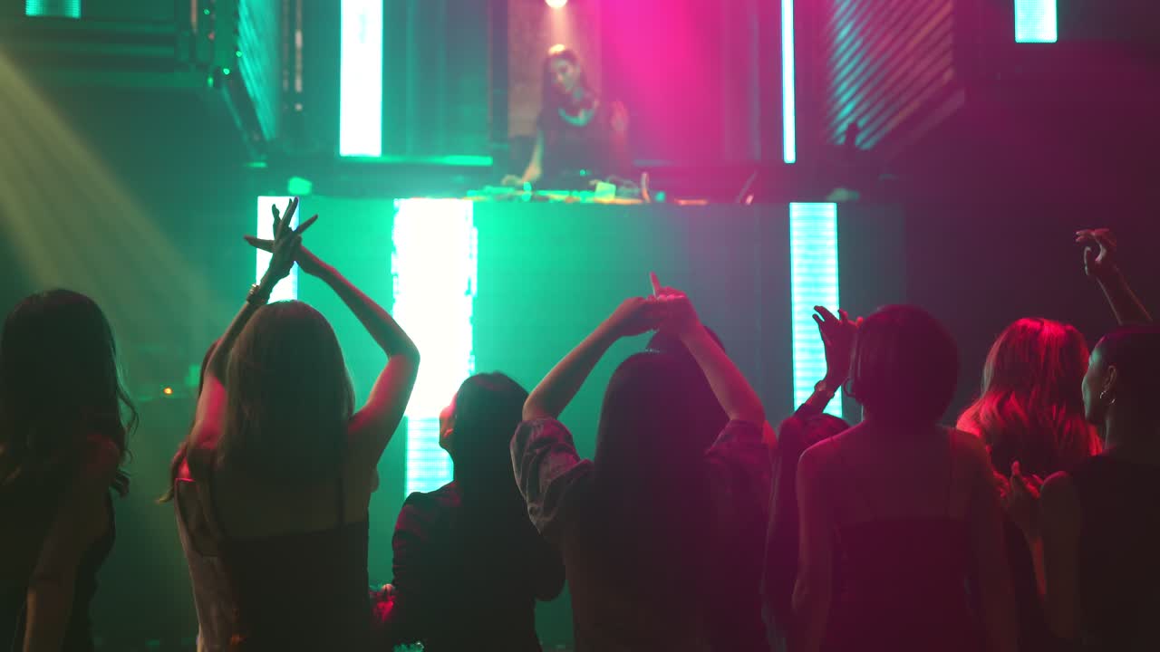 Group Of People Dance In Disco Night Club To The Beat Of Music From DJ On  Stage Free Stock Video Footage Download Clips