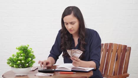 Middle-class-Indian-woman-counting-money